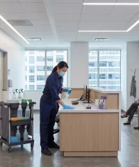 DMS janitor cleaning a medical office reception area