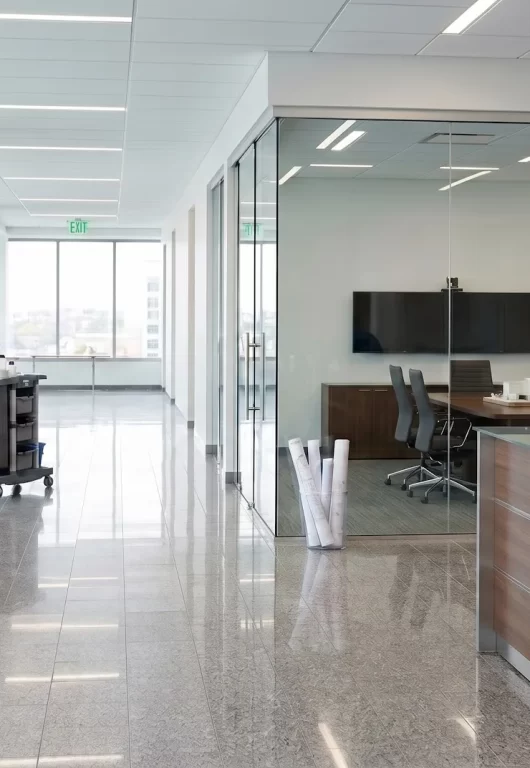DMS Janitorial cleaning technicians servicing a modern Orange County office